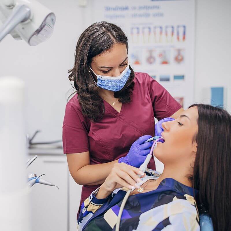 woman-getting-dental-cleaning